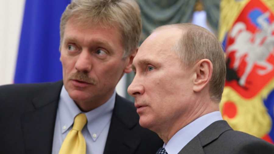 Kiemelt képen: Dmitrij Peszkov és Vlagyimir Putyin. Forrás: Szergej Iljin / Sputnik / AFP